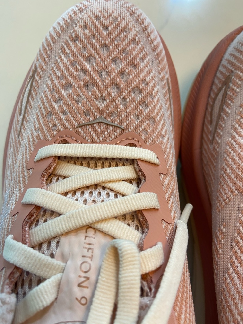 Hoka Clifton Women's Athletic Shoes in Blush Pink and White - Picture 14 of 16